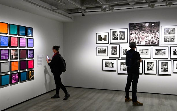 Visitors viewing art exhibits at KBr Photography Center, Fundación MAPFRE, Barcelona.