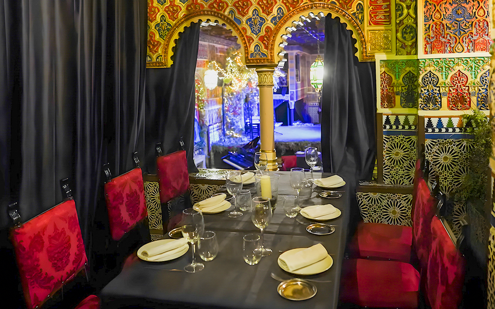 Dining area with ornate decor at Torres Bermejas Flamenco, Madrid.
