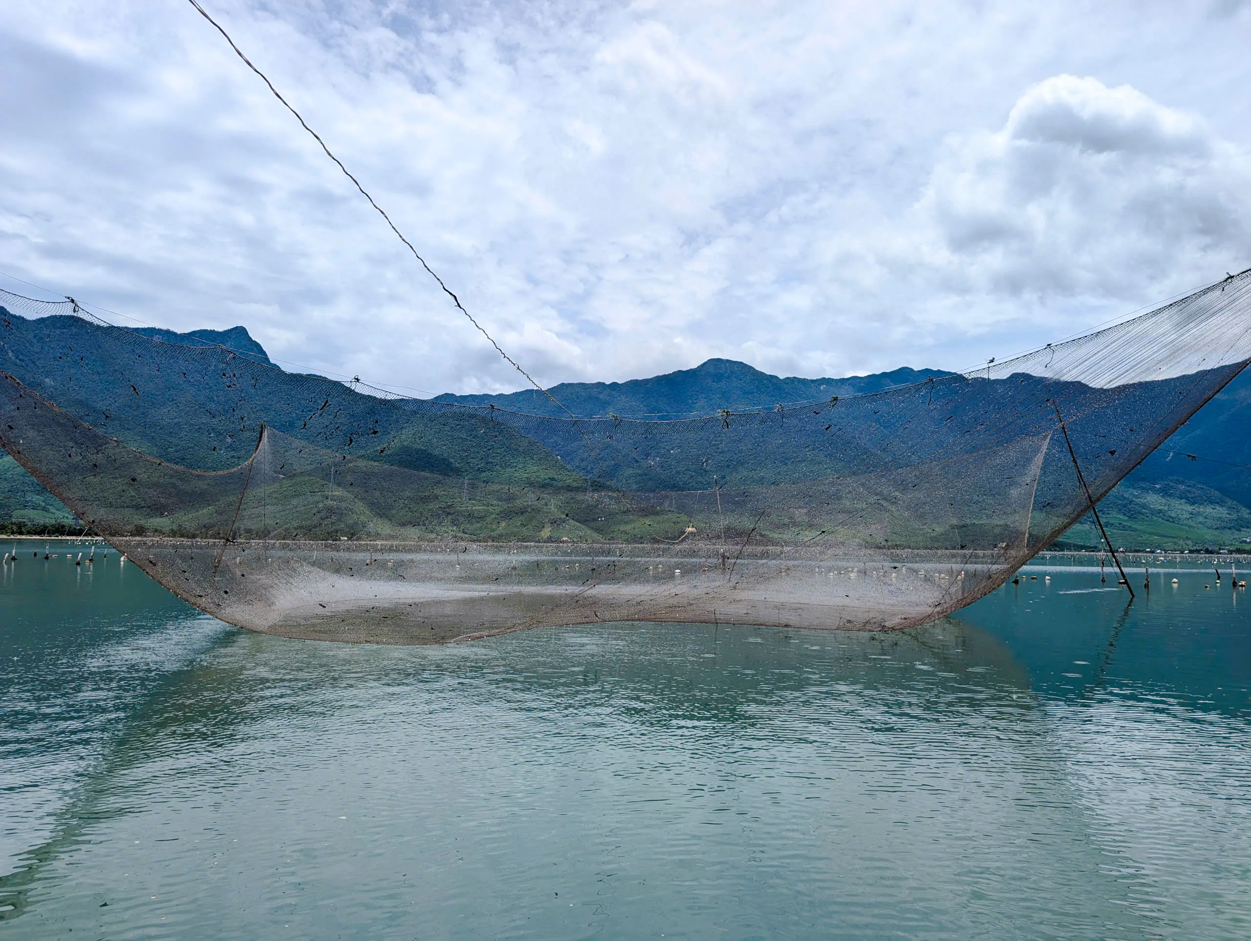 From Hue or Da Nang: Lap An Lagoon Oyster Farm and Fishing Cruise with Lunch