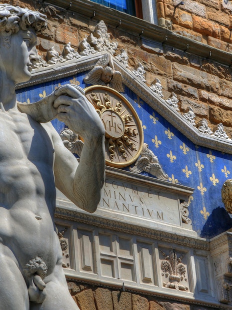 Statue of David replica outside Palazzo Vecchio, Florence city center.