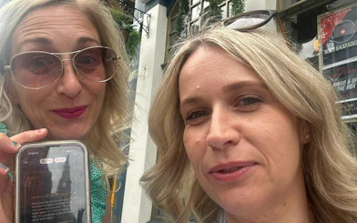 Women participating in Liverpool Murder Mystery self-guided city exploration game.