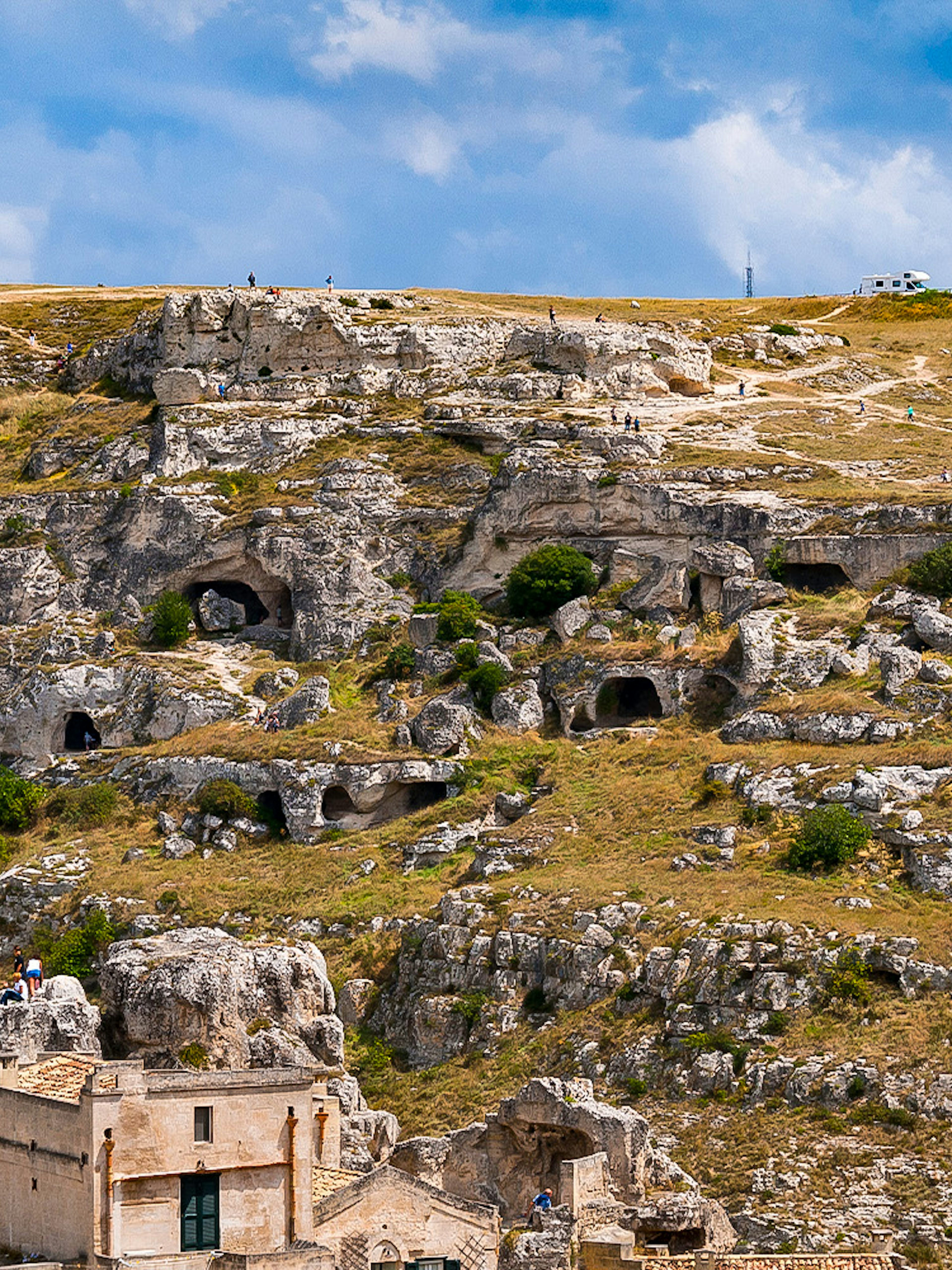 Rugged landscape of Murgia Park with ancient rupestrian churches and caves, Matera, Italy.
