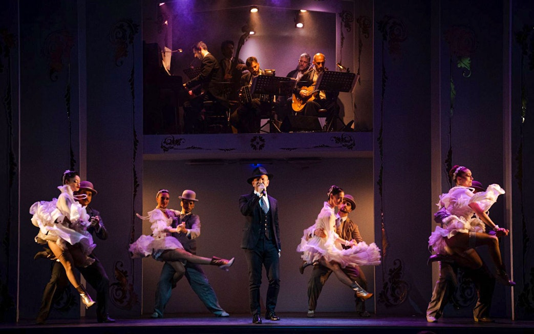 Dancers performing at Café de los Angelitos Tango Show in Buenos Aires.