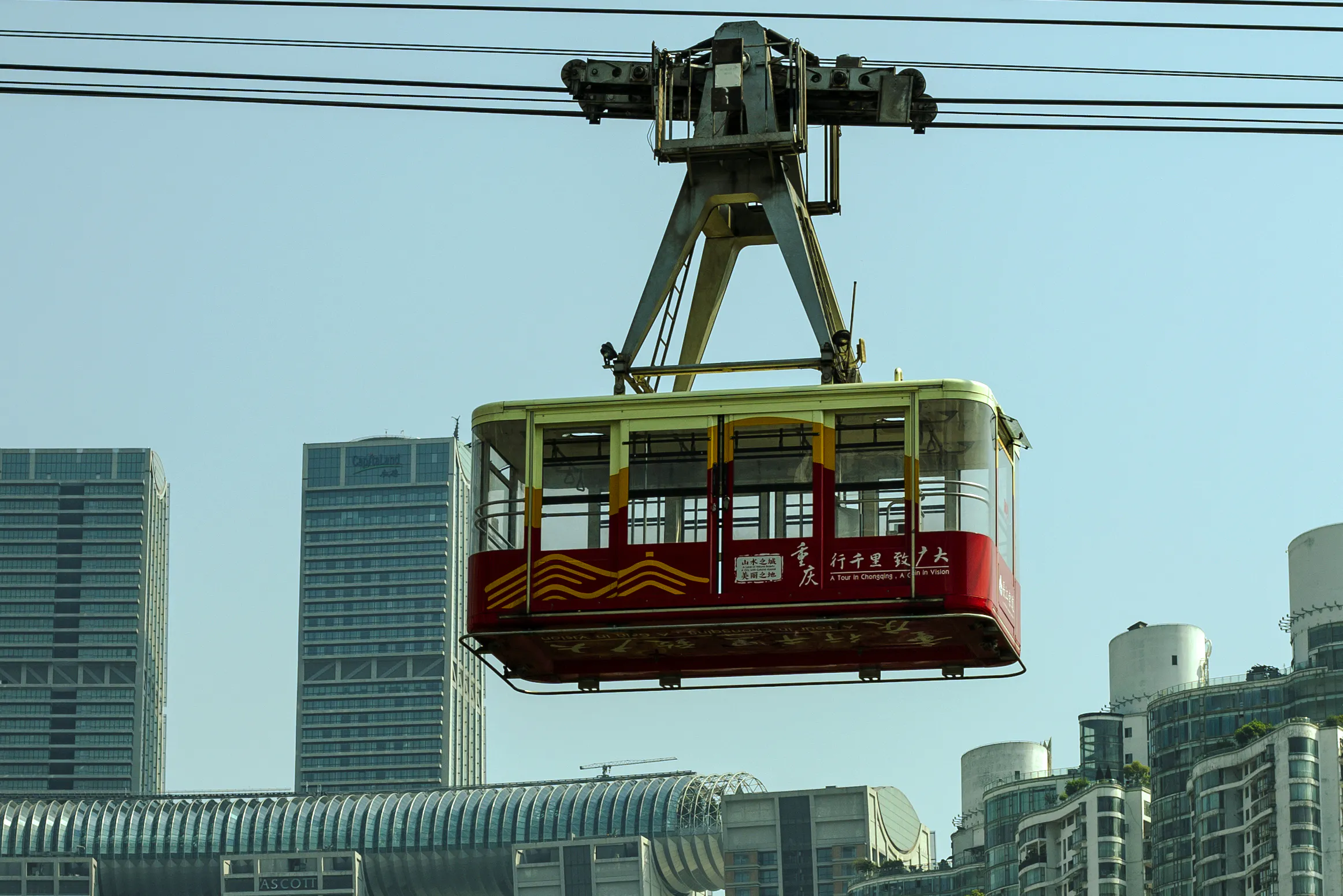 Cable car over Chongqing cityscape, part of a private custom travel itinerary in China.