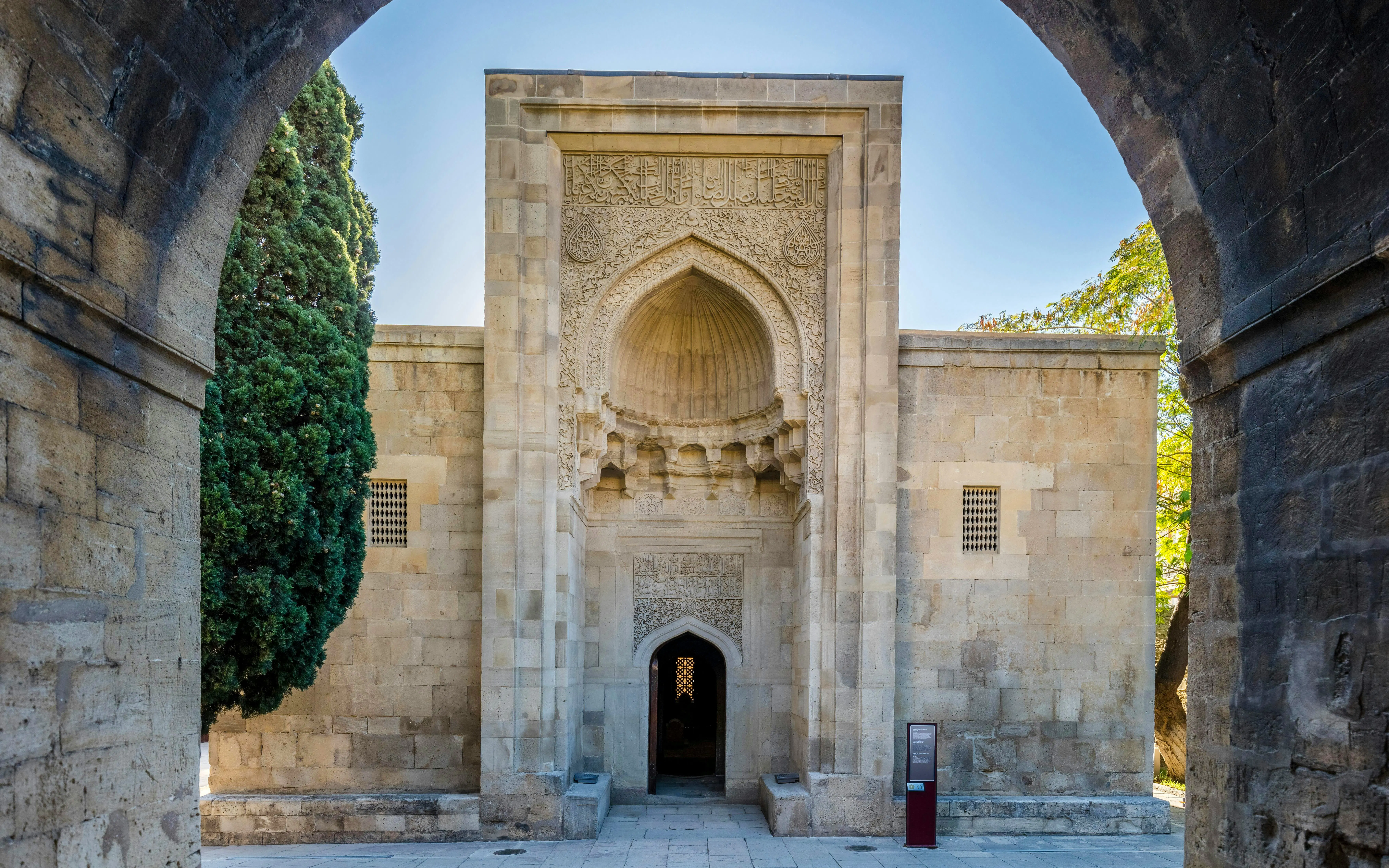 Palace of Shirvanshahs entrance with intricate stone carvings, Baku.