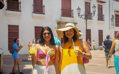 Visitors enjoying drinks in Cartagena's historic center.