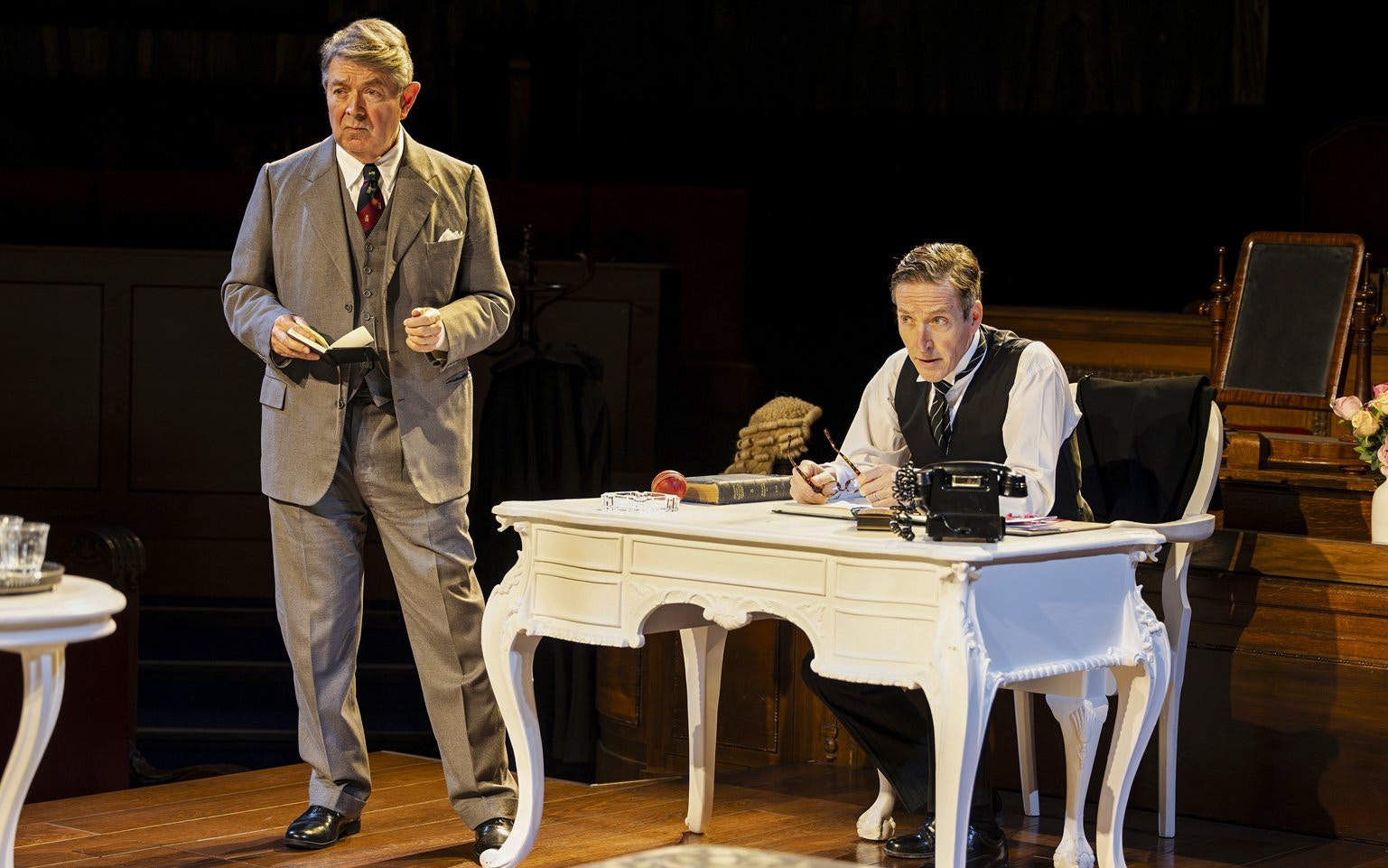 Stage scene from "Witness for the Prosecution" in West End courtroom setting.