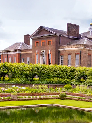 Kensington Palace with lush gardens in London, England.