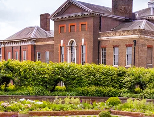 Kensington Palace with lush gardens in London, England.
