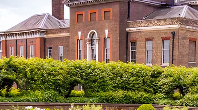 Kensington Palace with lush gardens in London, England.