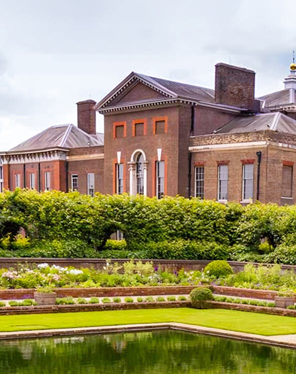 Kensington Palace with lush gardens in London, England.