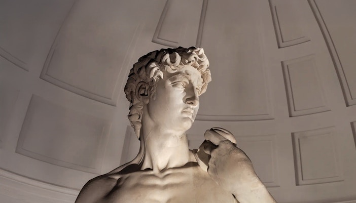 David statue close-up at Accademia Gallery, Florence, Italy.