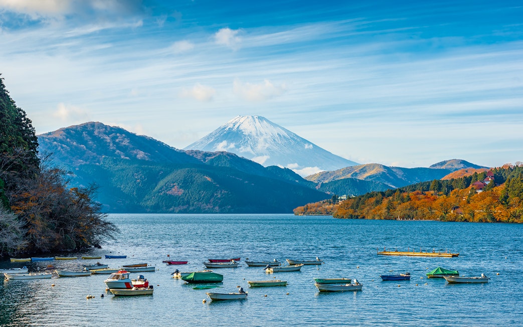 Boats on Lake Ashi with Mt. Fuji in the background, Japan.