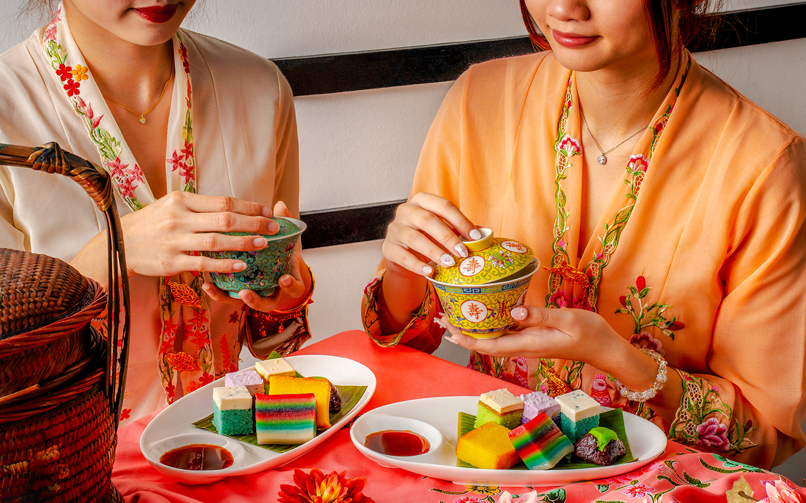 Traditional desserts with tea served at Wings of Time Fireworks Symphony show.