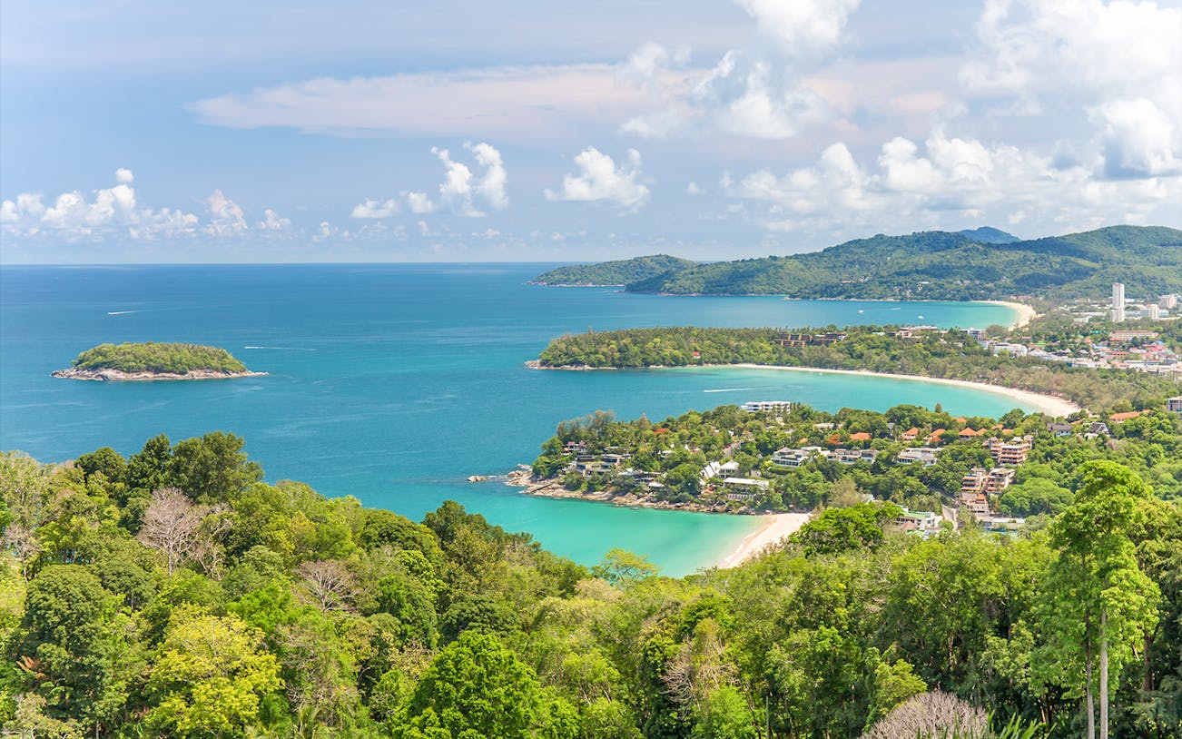 Kata Viewpoint overlooking beaches and lush greenery in Phuket, Thailand.
