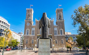 Statue in front of Athens Metropolitan Cathedral on Acropolis Guided Bike Tour.