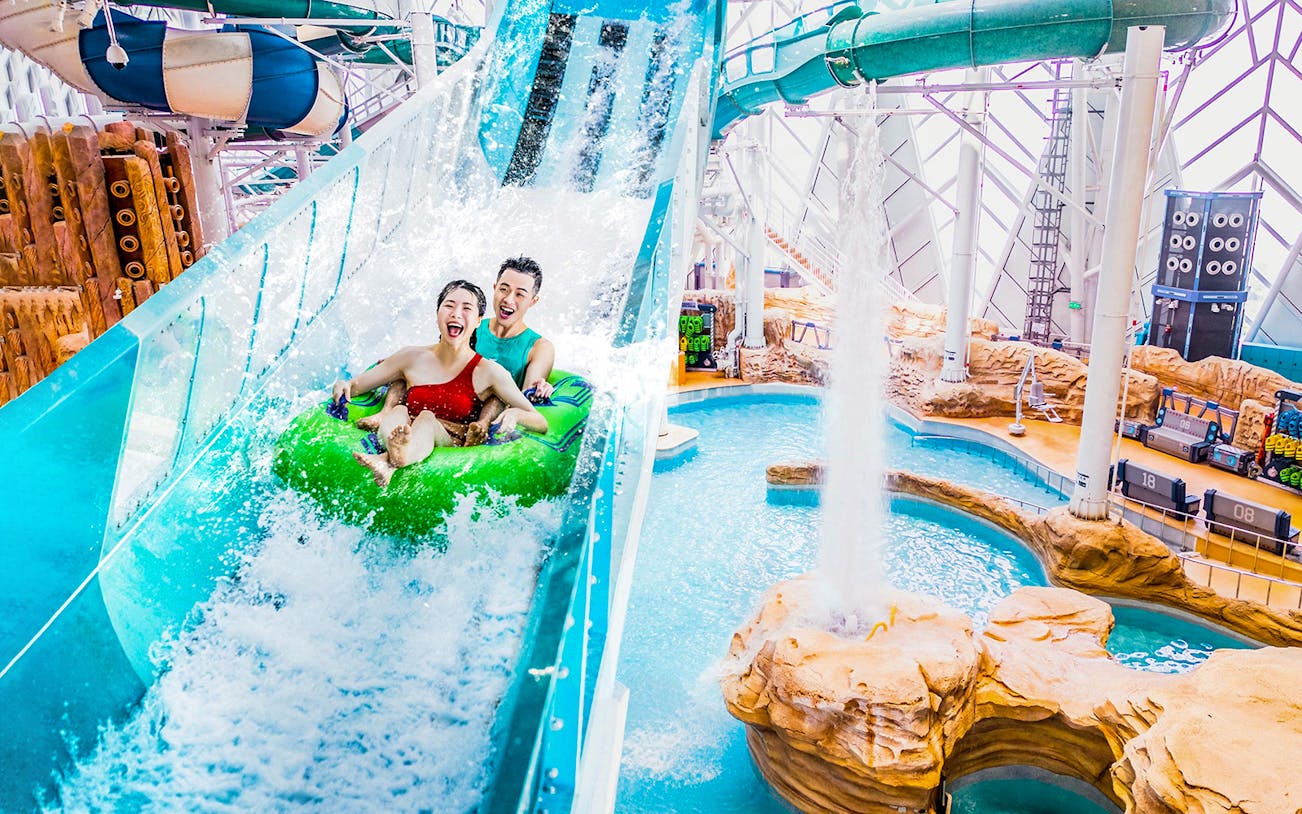 Couple on a slide at the Macau Studio City Water Park