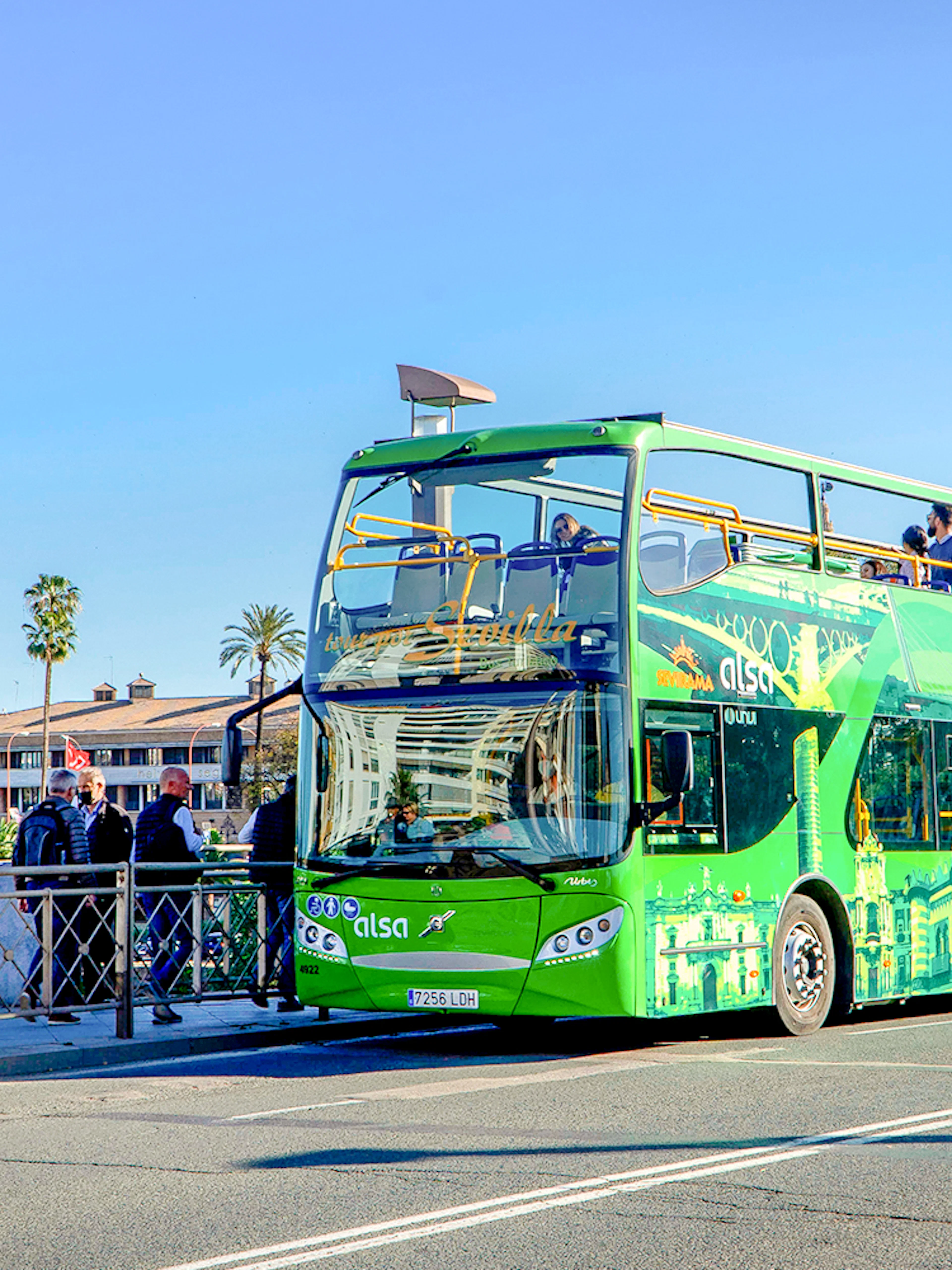 Hop-on hop-off bus near Torre del Oro, Seville.