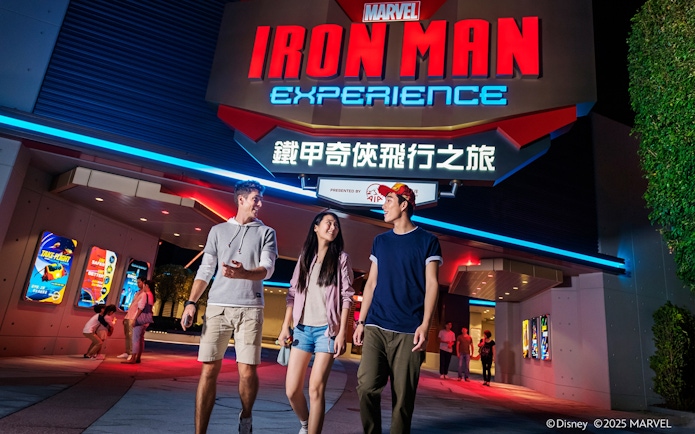 Visitors walking outside Ironman Experience at Disneyland Hong Kong.