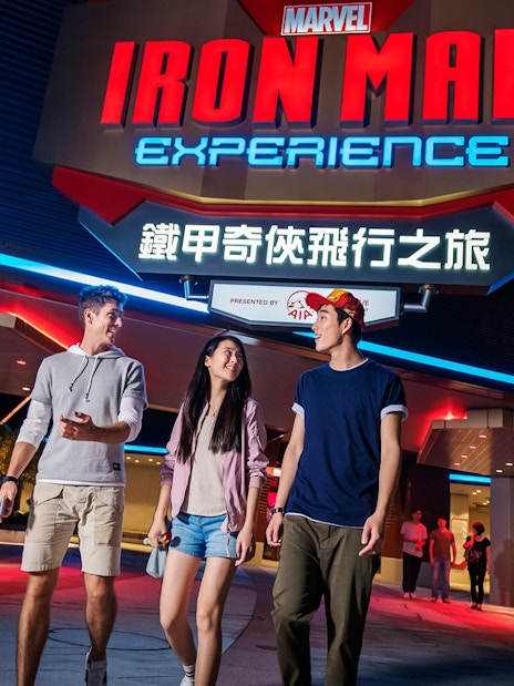 Visitors walking outside Ironman Experience at Disneyland Hong Kong.