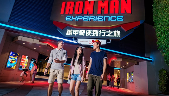 Visitors walking outside Ironman Experience at Disneyland Hong Kong.