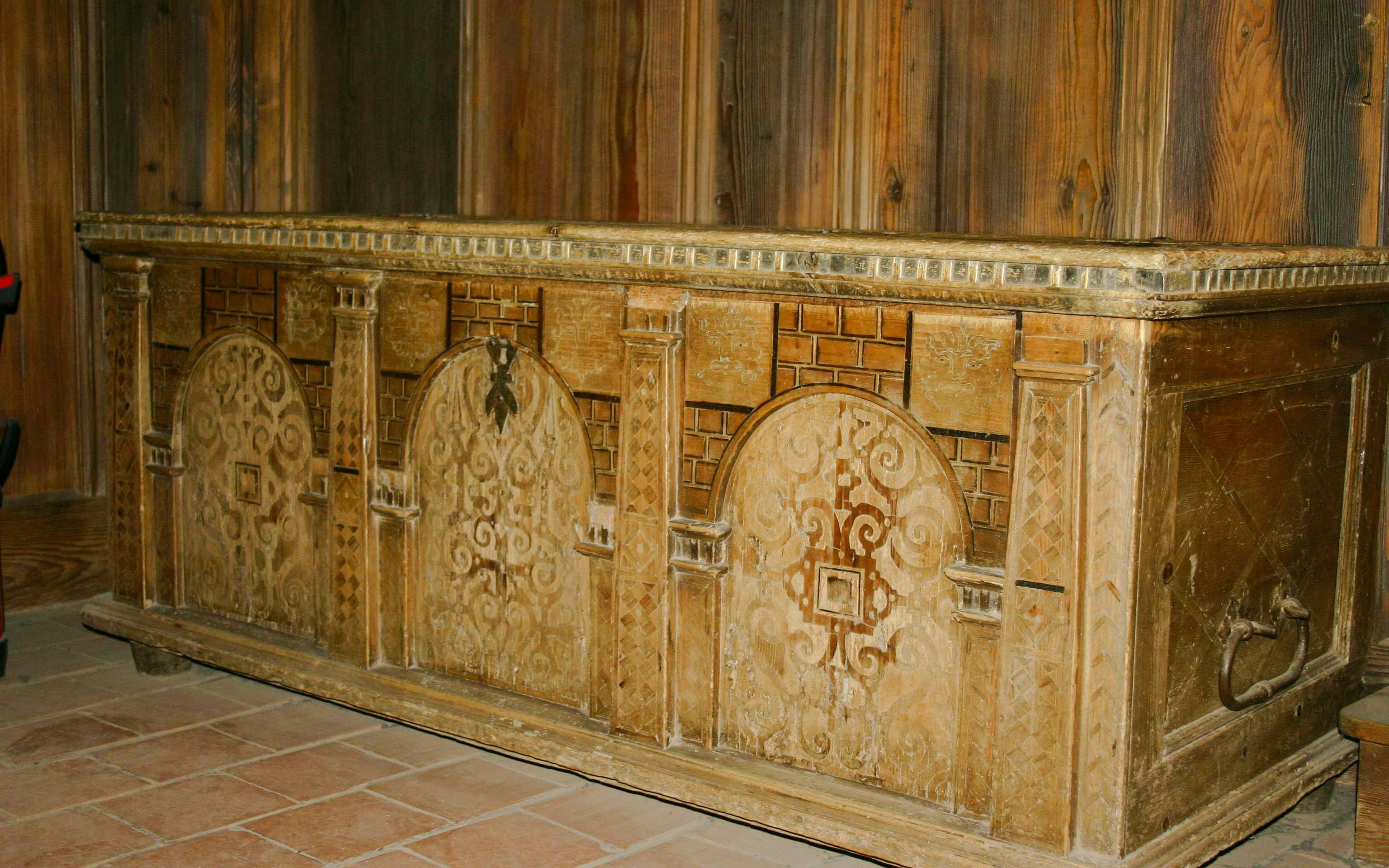 Ornate wooden chest with carvings inside Haut-Koenigsbourg Castle, France.