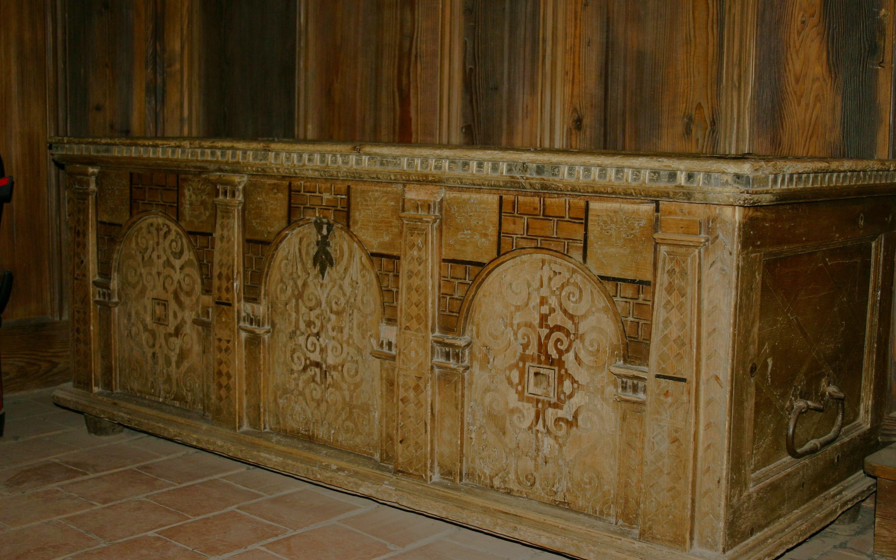 Ornate wooden chest with carvings inside Haut-Koenigsbourg Castle, France.