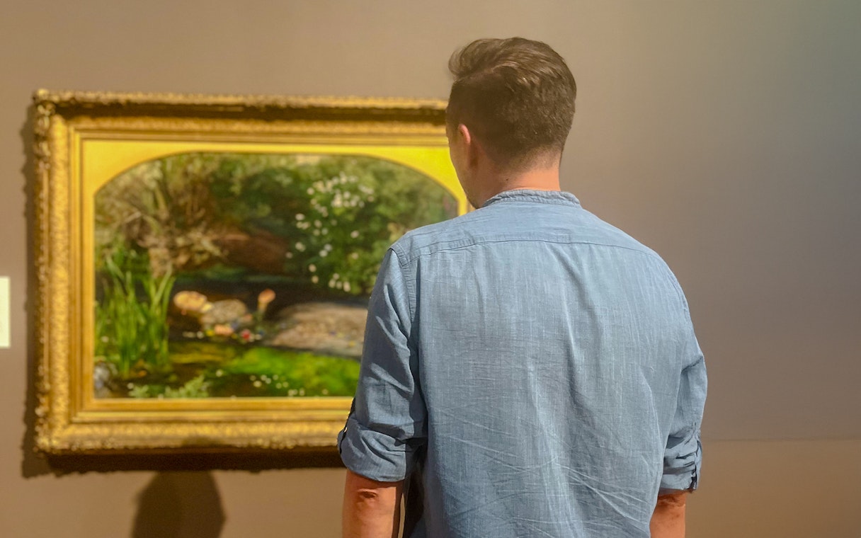 Visitor viewing painting during Tate Britain Discovery Tour.