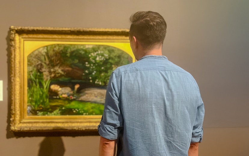 Visitor viewing painting during Tate Britain Discovery Tour.