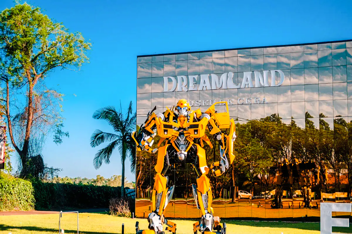 Giant yellow robot figure outside Dreamland Wax Museum, Foz do Iguaçu.