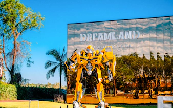 Giant yellow robot figure outside Dreamland Wax Museum, Foz do Iguaçu.