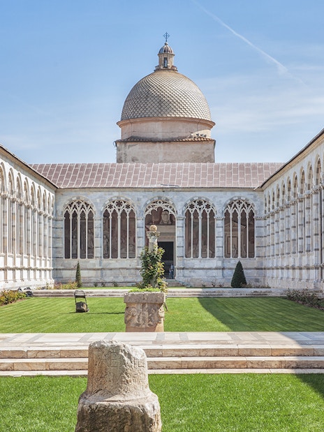 Camposanto Monumentale courtyard with arches, Pisa Cathedral Square, Italy.