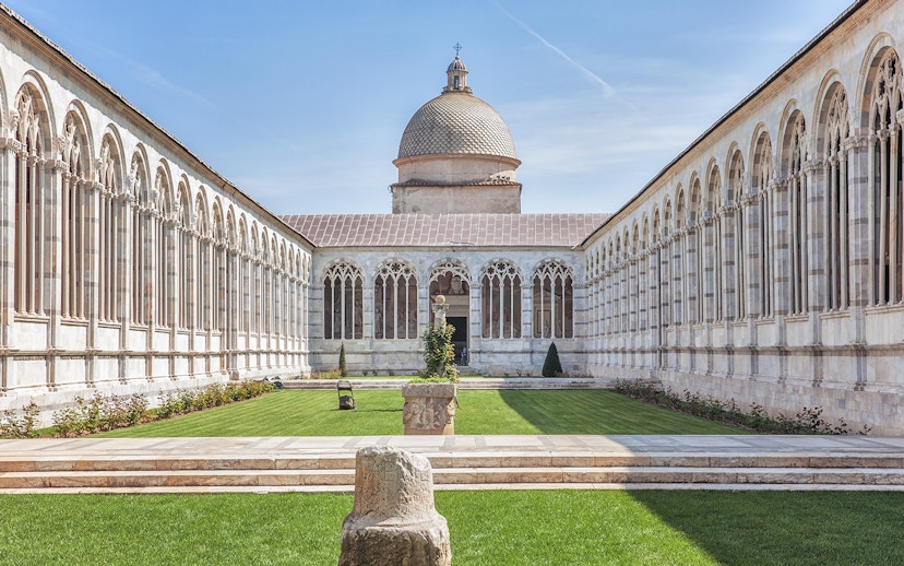 Camposanto Monumentale courtyard with arches, Pisa Cathedral Square, Italy.