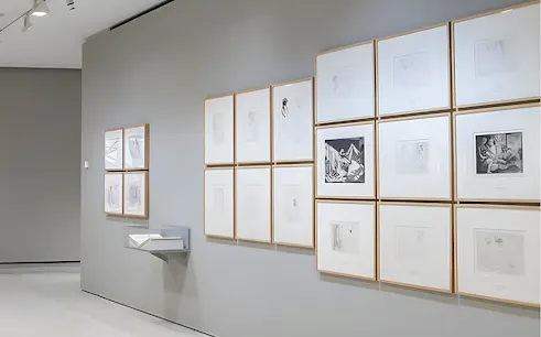 Art exhibition at Recoletos Room, Fundación MAPFRE, Madrid, featuring framed sketches and prints.