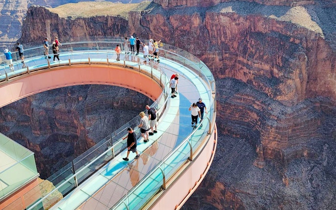 Visitors on the Skywalk overlooking the Grand Canyon West Rim, Arizona, USA.