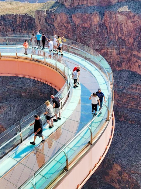 Visitors on the Skywalk overlooking the Grand Canyon West Rim, Arizona, USA.
