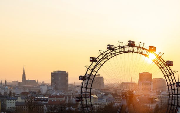 Vienna skyline with the Giant Ferris Wheel at sunset, EasyCityPass Vienna.