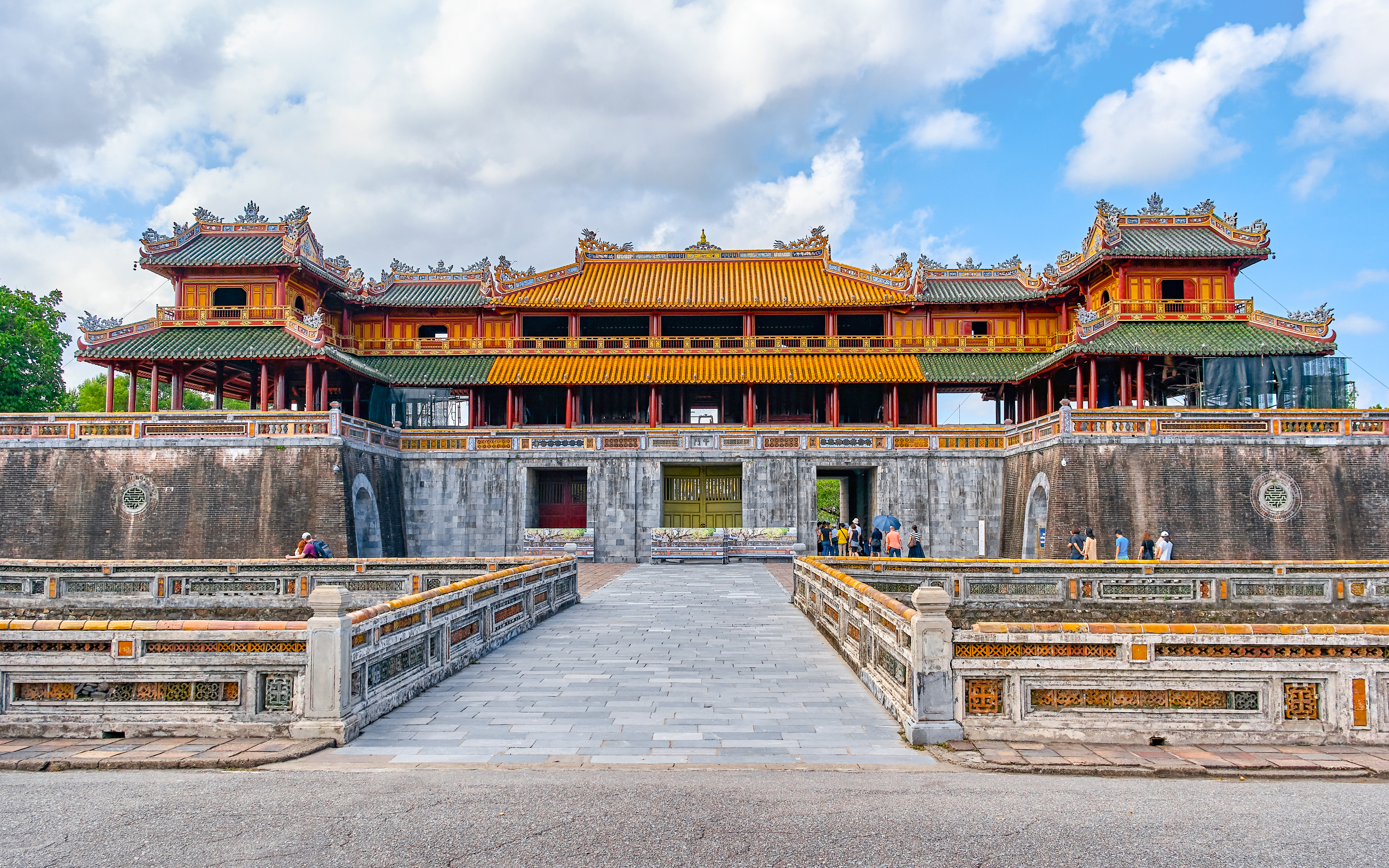 Imperial City gate with ornate architecture in Hue, Vietnam, a UNESCO World Heritage site.