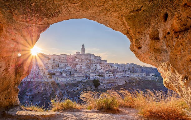 Sunset view of Matera from Parco Regionale della Murgia Materana cave.