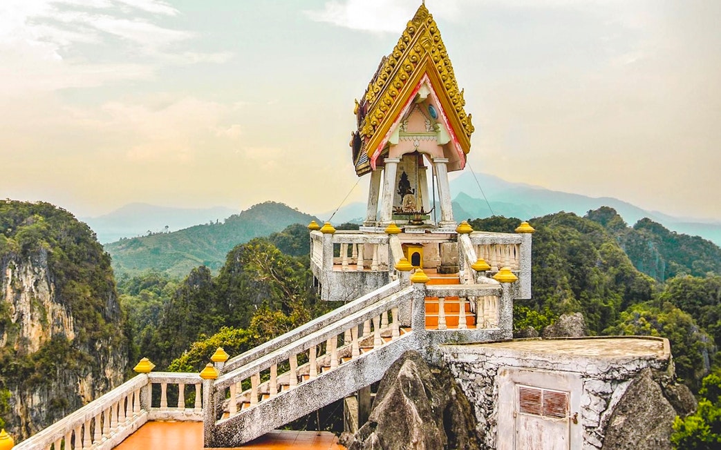 Tiger Cave Temple pagoda with mountain view in Krabi, Thailand.