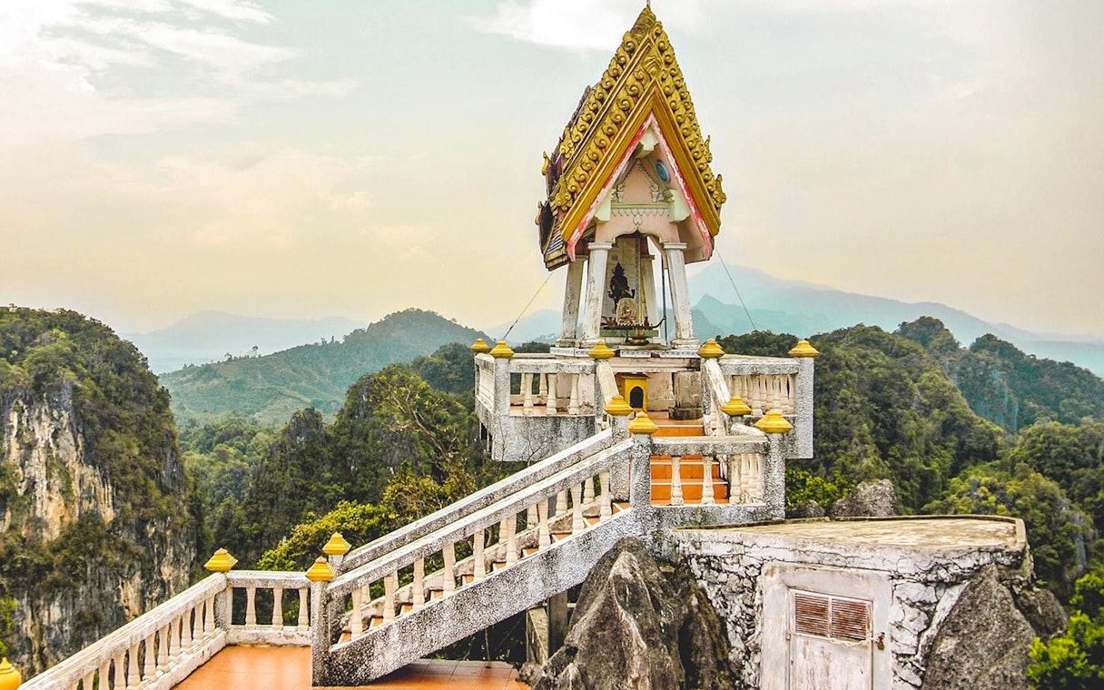 Tiger Cave Temple pagoda with mountain view in Krabi, Thailand.