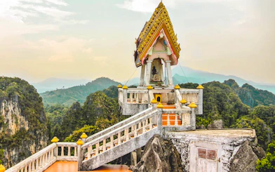 Tiger Cave Temple pagoda with mountain view in Krabi, Thailand.
