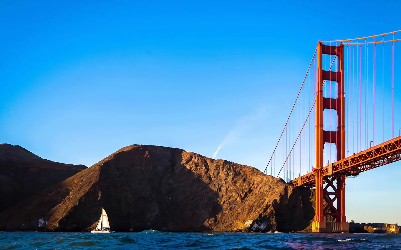 Sailboat near Golden Gate Bridge in San Francisco Bay.