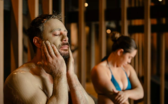 Self-application of geothermal mud at Wai Ariki Hot Springs & Spa, Rotorua.