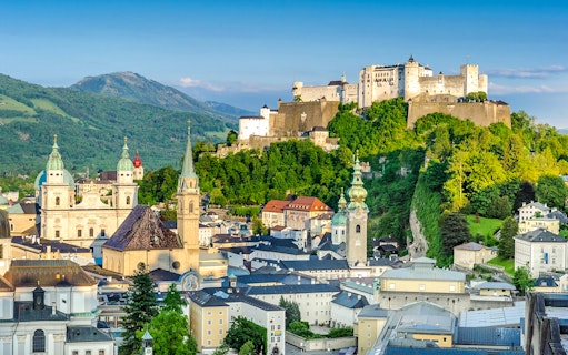 Hohensalzburg Fortress overlooking Salzburg cityscape, Austria.