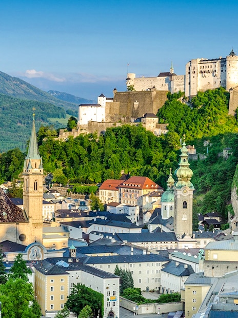 Hohensalzburg Fortress overlooking Salzburg cityscape, Austria.