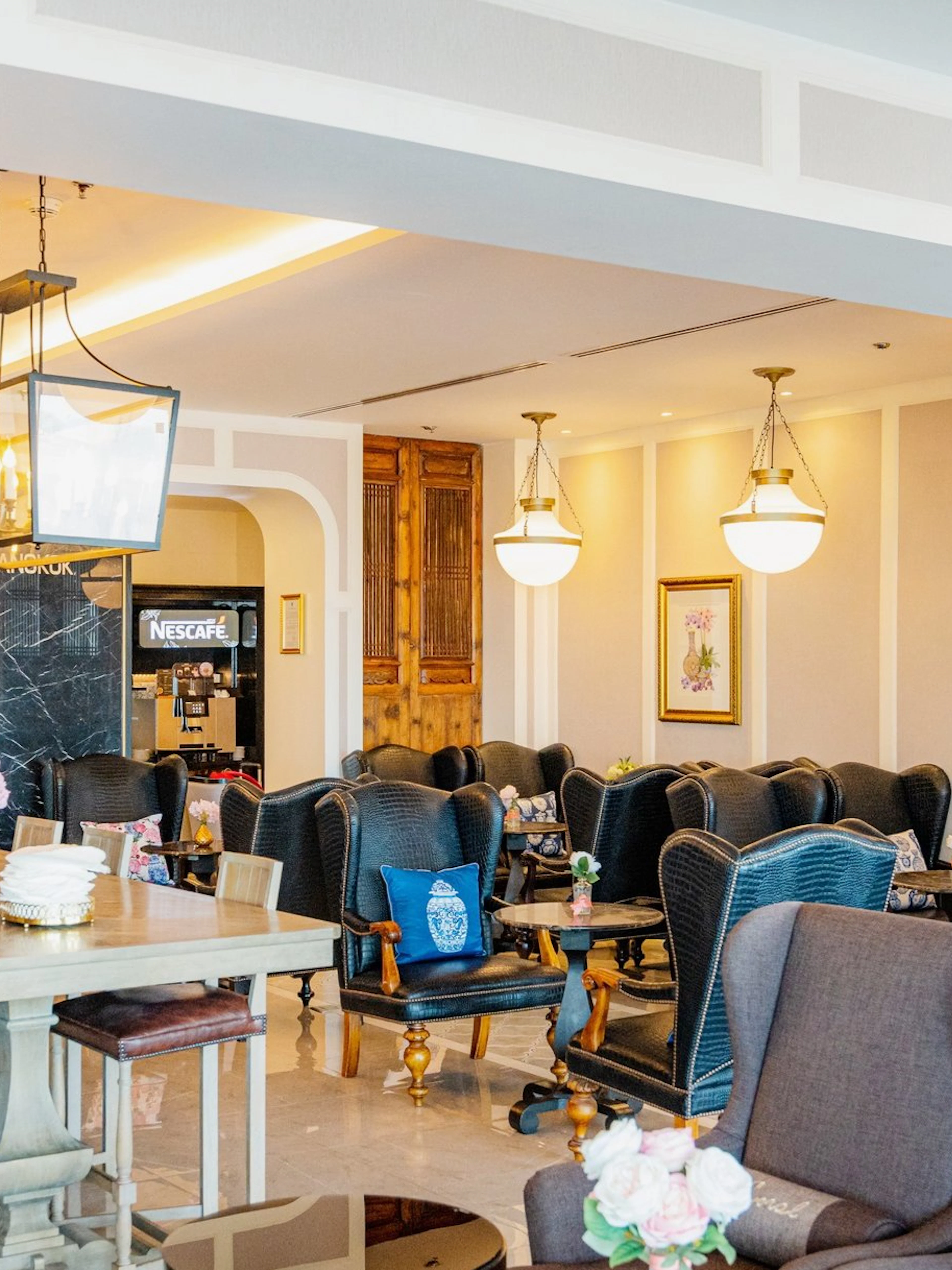 Coral International Lounge seating area at Phuket International Airport with elegant decor.