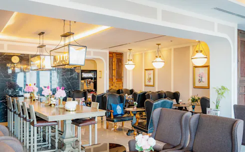 Coral International Lounge seating area at Phuket International Airport with elegant decor.