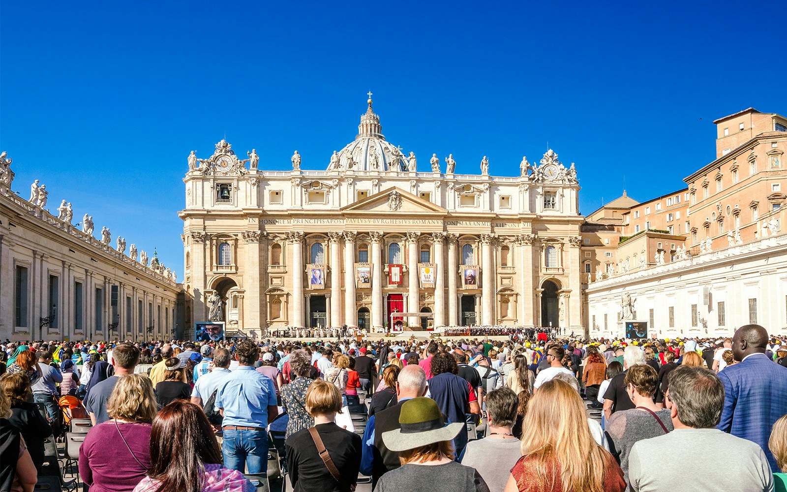 Crowd gathered at St. Peter's Square for Mass with Pope Francis in Vatican City.