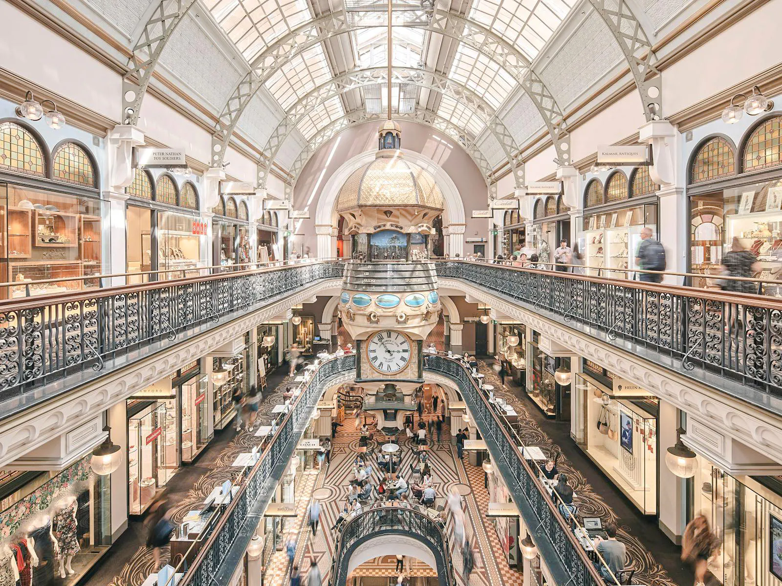 Queen Victoria Building interior with ornate architecture and central clock, Sydney.